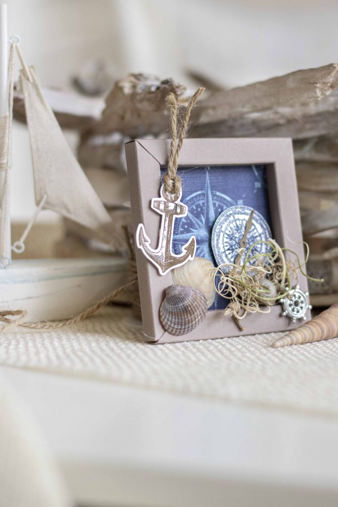 Origamirahmen maritimes Bild Leuchtturm Muscheln Materialbild