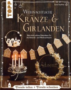 Kraenze und Girlanden zur Weihnachtszeit